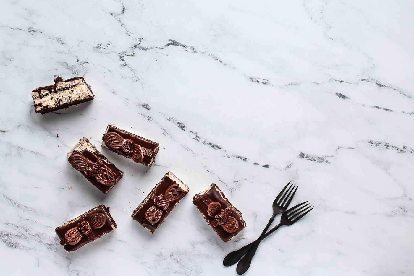 Marble Photography Backdrop 2 ft x 3 ft board | 3 mm thick with little chocolate cakes and forks