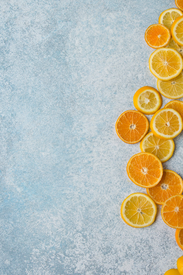 Blue Stone Photography Backdrop 2 ft x 3ft board with oranges and lemon slices lined up