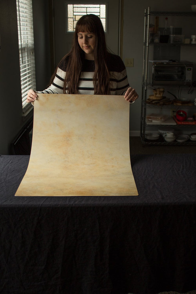 Super-Thin & Pliable Golden Yellow Marble Photography Backdrop 2 ft x 3 ft, Lightweight, Moisture & Stain-Resistant behind the scenes