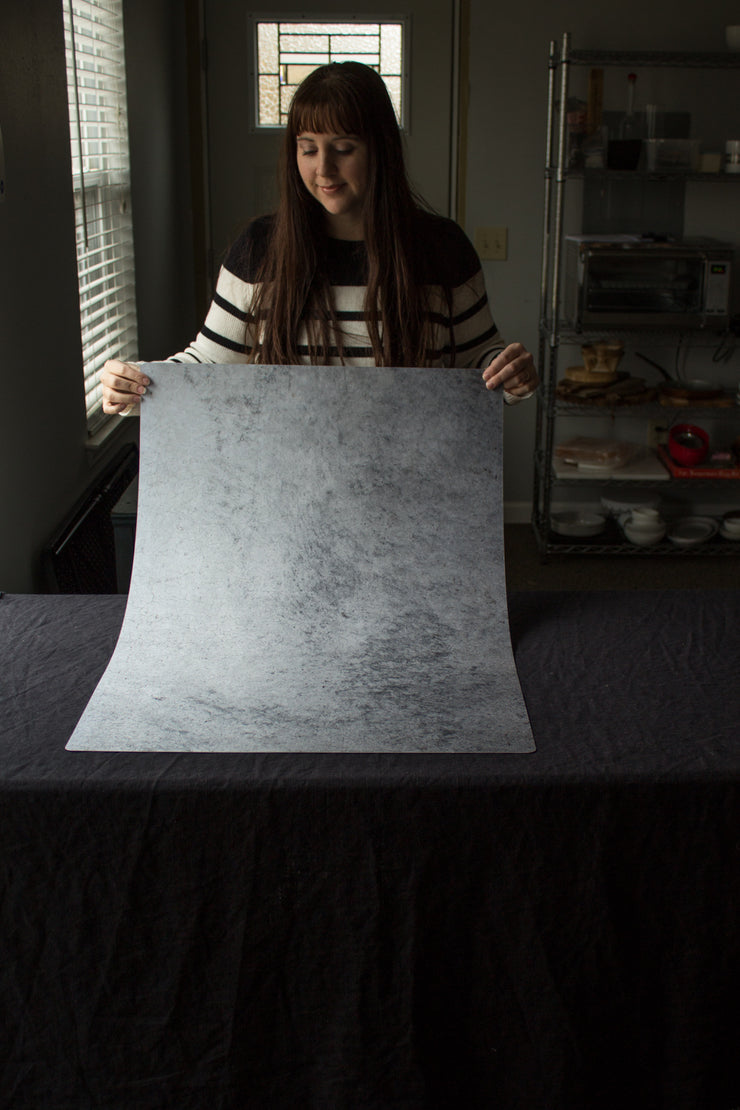 Super-Thin & Pliable Gray Concrete Photography Backdrop 2 ft x 3 ft, Lightweight, Moisture & Stain-Resistant behind the scenes