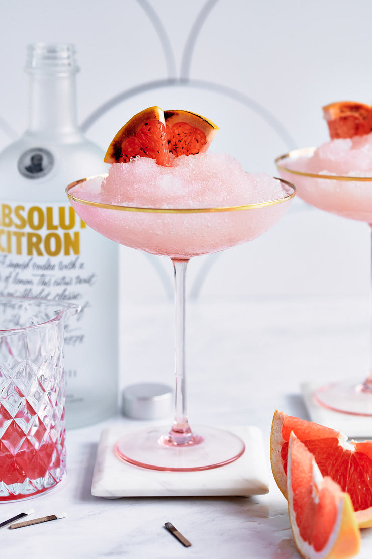Pink Ice drink in glasses with oranges with a Scalloped Tiles Replica Photography Backdrop