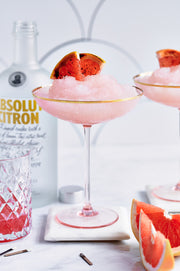 Pink Ice drink in glasses with oranges with a Super-Thin & Pliable Scalloped Tiles Replica Photography Backdrop
