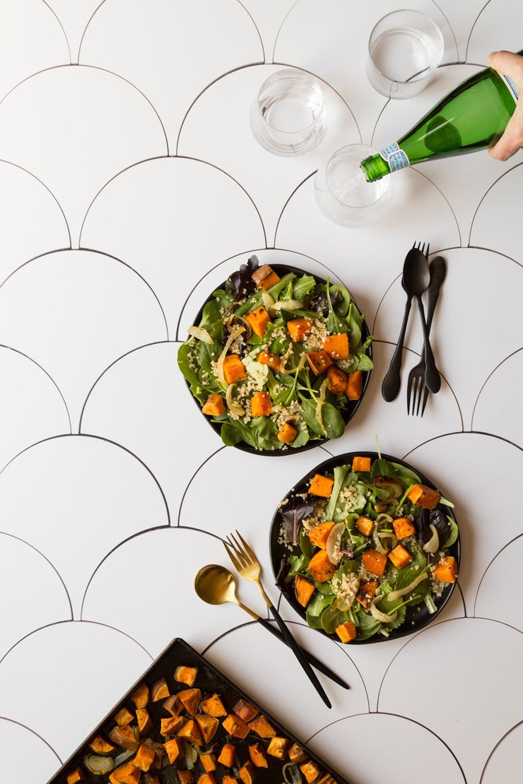 Squash salad and sparkling water in glasses on a Super-Thin & Pliable Scalloped Tiles Replica Photography Backdrop
