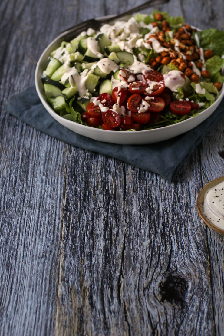 Silver Blue Reclaimed Wood Photography Backdrop 2 ft x 3 ft board | 3 mm thick with a salad on a plate up close