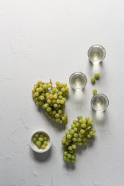 Simple White Textured Photography Backdrop 2 ft x 3 ft with grapes
