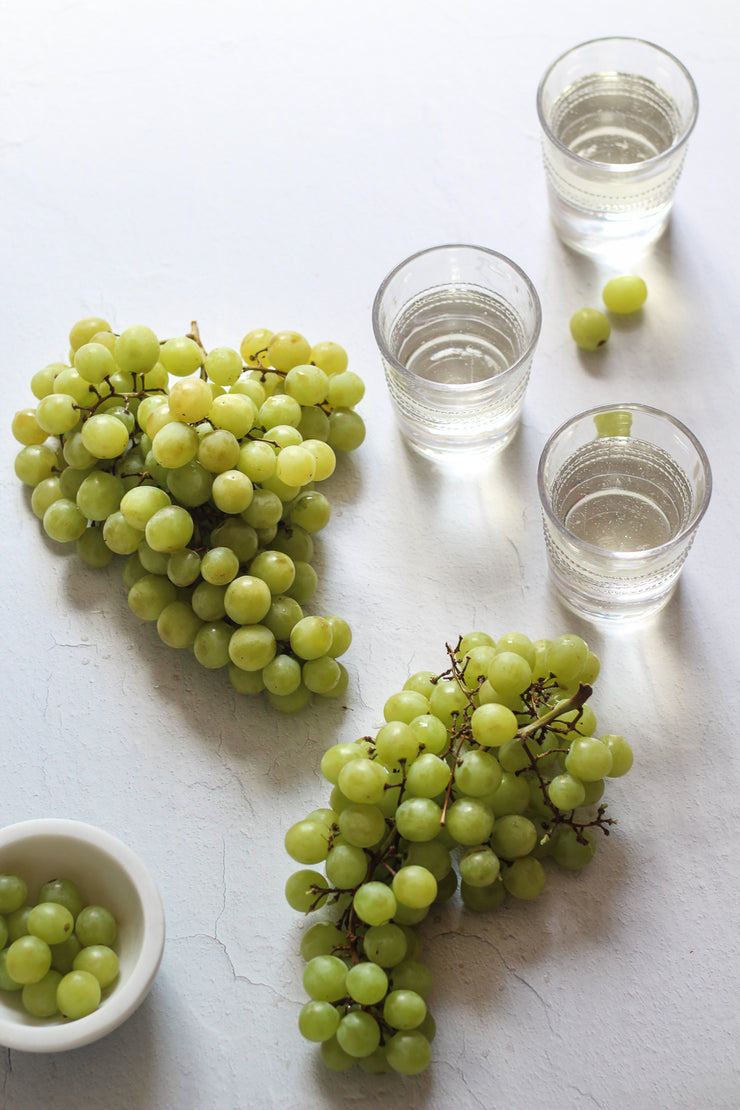 Simple White Textured Photography Backdrop 2 ft x 3 ft with grapes and glasses