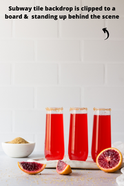 Super-Thin & Pliable Subway Tile with White Grout Photography Backdrop with glasses of red soda and oranges
