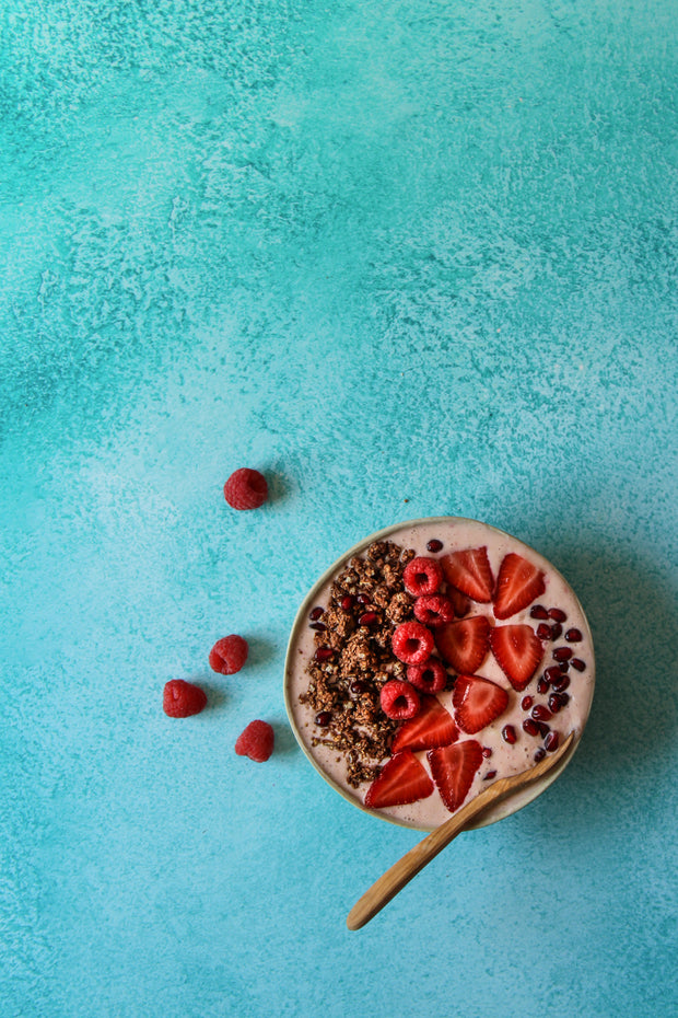 Turquoise Blue Green Painted Photography Backdrop 2 ft x 3 ft board 3 mm thick with a smoothie bowl and raspberries