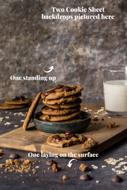 Super-Thin & Pliable Cookie Sheet Photography Backdrop 2 ft x 3 ft, Lightweight, Moisture & Stain-Resistant with cookies stacked and a glass of milk