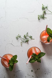 White Chipped Paint Photography Backdrop 2 ft x 3 ft | 3 mm thick and glasses of grapefruit juice, mint, and ice