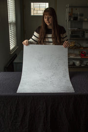 Super-Thin & Pliable White Plaster Photography Backdrop 2 ft x 3 ft, Lightweight, Moisture & Stain-Resistant behind the scenes